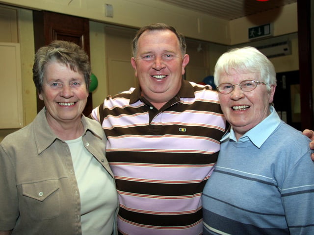 Donal poses for a photograph with his aunts, Vera and Anna 0215JML : Parties and celebrations across Derry in May 2006.