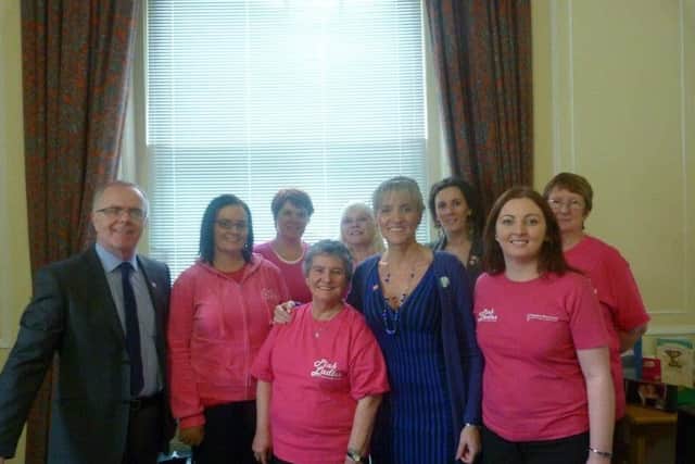 The Pink Ladies meeting Sinn Fein MLA’s Martina Anderson and Raymond McCartney
on a visit to Stormont Parliament Building.
Maureen was there to meet with SDLP MLA Alex Attwood to discuss the Pink Ladies' 'Cost of
Cancer' campaign.