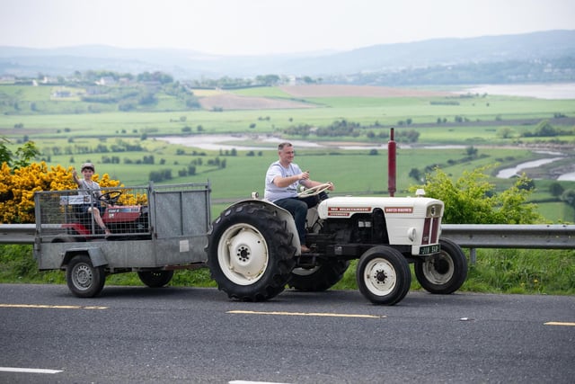 Calvin Wylie and Alan Wylie at the Allen Wylie Memorial Tractor Run from Letterkenny to Newtoncunningham on Saturday last  held to raise funds for the Good & New Cancer Bus.    Photo Clive Wasson