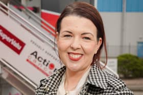 Action Cancer’s new Patron Lisa McGee pictured outside the charity’s Big Bus which travels to 200 locations every year offering breast screenings to local women. Photo Brian Thompson.