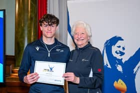 Limavady judo competitor Antoni Zietala is pictured with Lady Mary Peters