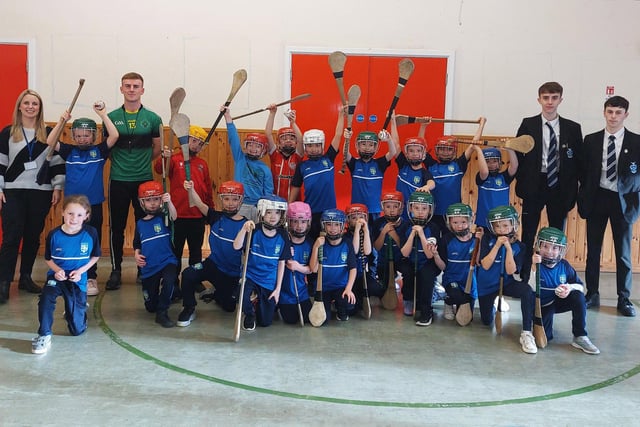 Mrs O'Donnell's class at their hurling coaching with our School GPO, past pupil Mark McCloskey. Included in the picture are past pupils Eoin Hall and Tiernan McGonagle.