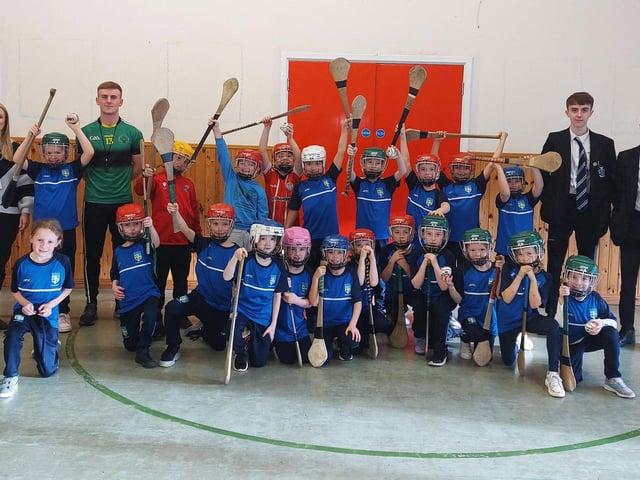 Mrs O'Donnell's class at their hurling coaching with our School GPO, past pupil Mark McCloskey. Included in the picture are past pupils Eoin Hall and Tiernan McGonagle.