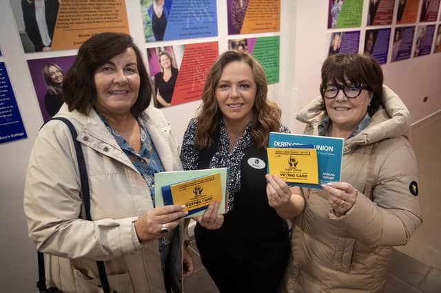 DCU's Sharon Doherty pictured with long term members Susanne Cooley and Teresa Cooley on Monday night. : .