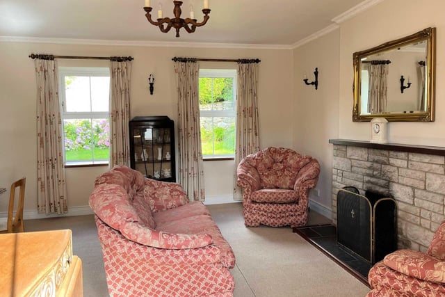 This beautifully maintained and modernised 2-storey, 3 bedroom farmhouse stands on a one acre site with Outbuildings and Sheds at Tullymore halfway between Malin Village and Malin Head only 5 minutes from Five Fingers Strand . The house which is part of an overall farm of 33 acres is being sold as a separate unit and is in excellent condition having been modernised yet retains many original features. The property, built around 80 years ago, has Bangor blue slates, pebble dash render, three spacious bedrooms, dual central heating, modern kitchen and spacious living room.