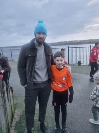 Danny Quigley supporting Kian Sweeney, who ran for 12 consecutive days to raise funds for SANDS NI.