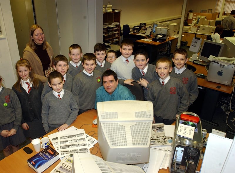 John Gill with students during a visit to the Journal offices in Buncrana Road.