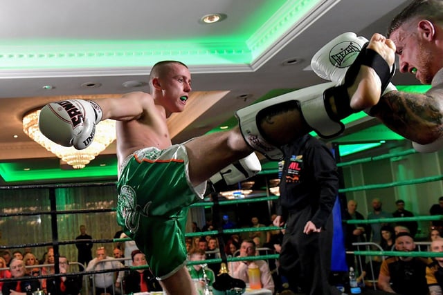 Rathmor Warriors’ Jake Mooney (left) defeated Dennis Lafferty, SMAA, to win the Lightweight LK Irish Title, on Saturday evening last, in the Everglades Hotel. Photo: George Sweeney. DER2312GS – 68