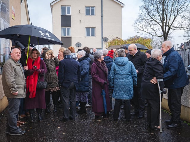 The family, friends and former band mates of Bobby Stott at the unveiling of a plaque in his memory on Sunday.