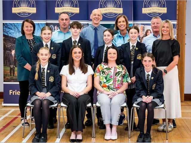 17. Students who received Colours Awards with Ms Paula Fleming (Head of PE), Mr Chris Ryan (Co-ordinator of Extra-curricular Programme), Mrs Suzanne Deery, Mr Michael McCullagh,  Ms Connie O’Brien and Extra-curricular coaches Mrs Martina McMullan, Mrs Teresa Gillespie and Mr Tom Doherty. Stephen Latimer