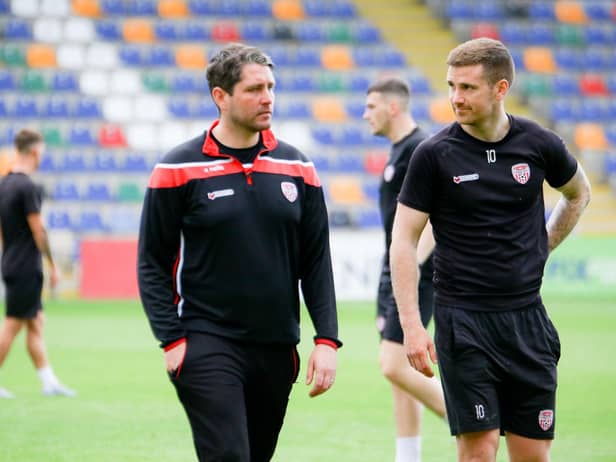 Derry City boss Ruaidhri Higgins and his skipper Patrick McEleney.