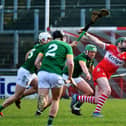 Meath players charge after Derry’s Gerald Bradley. Photo:  George Sweeney