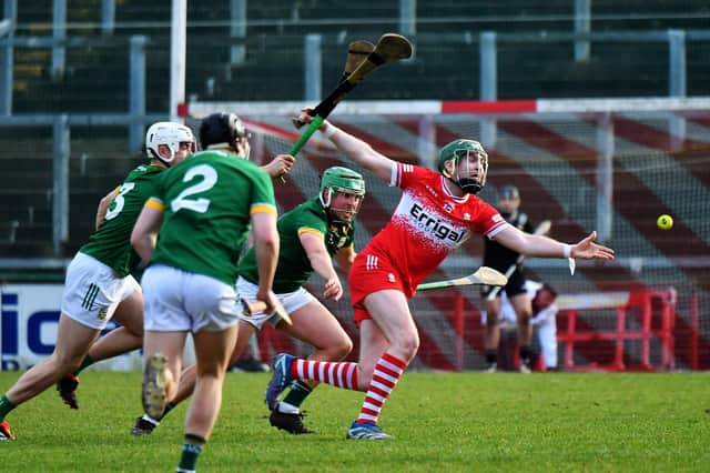 Meath players charge after Derry’s Gerald Bradley. Photo: George Sweeney