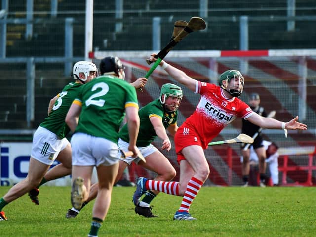 Meath players charge after Derry’s Gerald Bradley. Photo:  George Sweeney