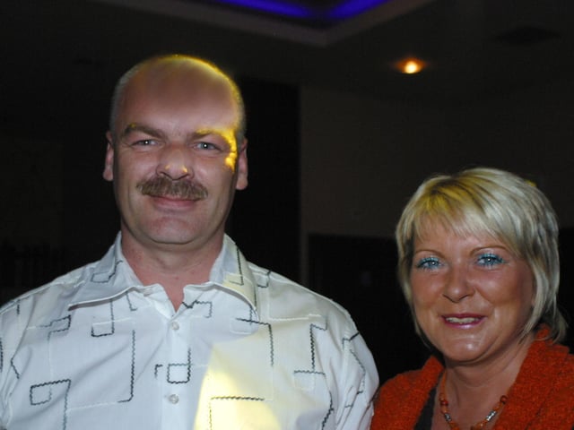Anita Crawford pictured with husband Earl enjoying the party. 160dd