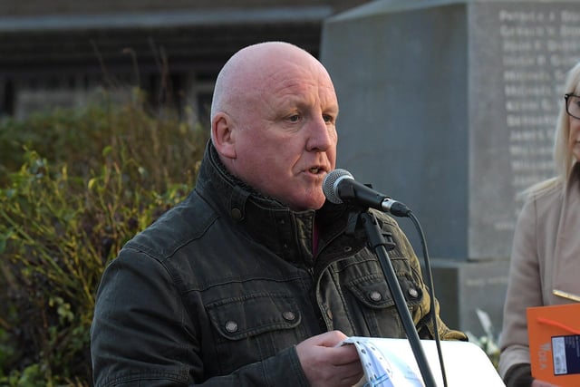 Paul Doherty reads a statement at the Bloody Sunday monument at Joseph’s Place on Tuesday afternoon where a one minute silence was observed on the 52nd anniversary of the Bloody Sunday massacre. Photo: George Sweeney.