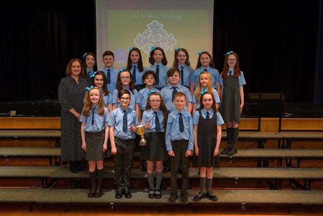 Musical director Nicola Soal pictured with St Anne’s Primary School choir, winners the Gregorian Cup at the Derry Feis Choir Competitions held in St Mary’s College on Tuesday.  Photo: George Sweeney.  DER2314GS – 05
