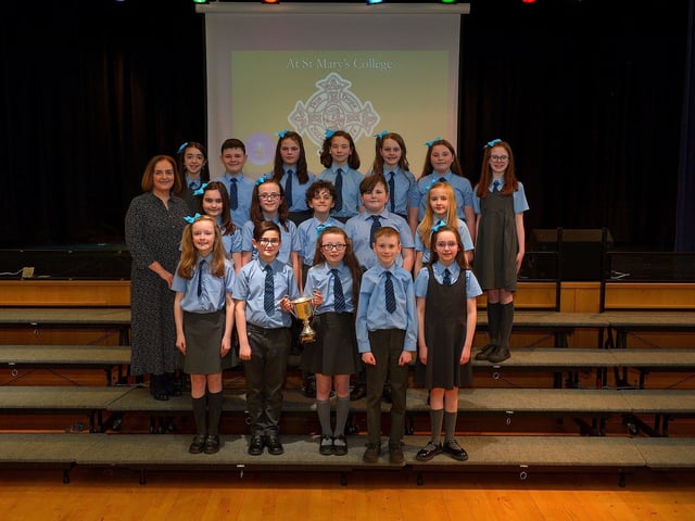 Musical director Nicola Soal pictured with St Anne’s Primary School choir, winners the Gregorian Cup at the Derry Feis Choir Competitions held in St Mary’s College on Tuesday. Photo: George Sweeney. DER2314GS – 05