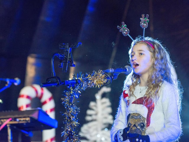 Cora Harkin performs on stage at the Christmas Lights Switch on in Guildhall Square. Picture Martin McKeown. Inpresspics.com. 23.11.17