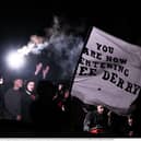 Derry City supporters during a power cut at half-time of the clash against Shelbourne at Tolka Park in Dublin. Photo by Stephen McCarthy/Sportsfile
