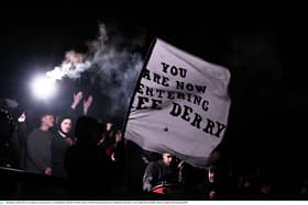 Derry City supporters during a power cut at half-time of the clash against Shelbourne at Tolka Park in Dublin. Photo by Stephen McCarthy/Sportsfile