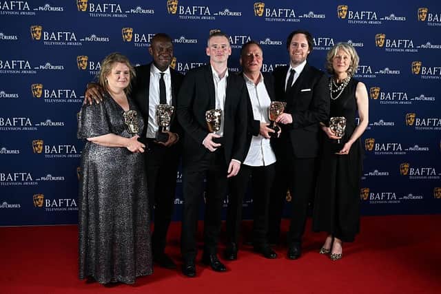 LONDON, ENGLAND - MAY 11: Emma Parkins, Clive Myrie, Ed Stobart, Denis Minihan, Jane Magowan and members of cast and crew pose with the Daytime Award for 'Clive Myrie's Caribbean Adventure' inside the Winners Room at the 2025 BAFTA Television Awards with P&O Cruises at The Royal Festival Hall on May 11, 2025 in London, England. (Photo by Stuart C. Wilson/Getty Images)