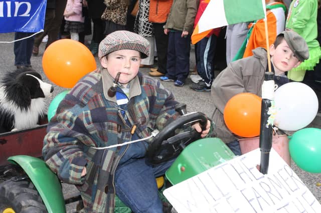 HOW'S IT GOING SIR!. . . These two young gents are suitably attired for the St. Patrick's Day Parade in Buncrana. 1903JM79