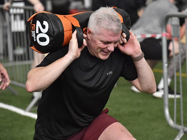Competitor during the sandbag lunges station during the Maiden City Hyrox V Fitness Challenge held at Sean Dolans GAC on Saturday. Photograph: George Sweeney