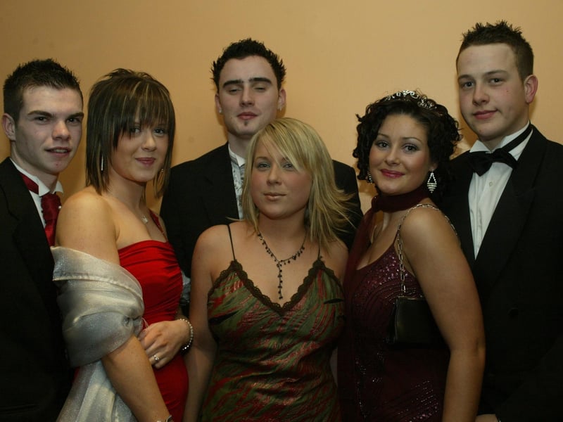 Louise Travers, Christina O'Neill and Karina Smith with partners Vinne Morrison, Michael Harkin and Damian Roberts.  (0203JB48):Attendees enjoying the Thornhill College formal in April 2004.