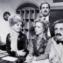 The cast of Fawlty Towers actors Prunella Scales, Connie Booth, John Cleese and Andrew Sachs on the BBC set whilst filming the comedy show in London, UK, on Thursday, January 18, 1979. (Photo by Bryn Colton/Getty Images)