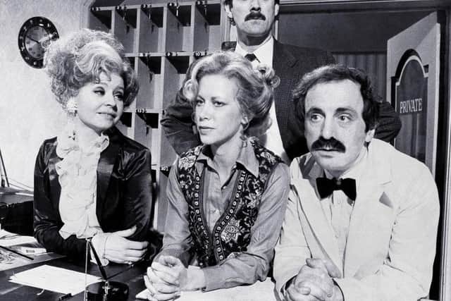 The cast of Fawlty Towers actors Prunella Scales, Connie Booth, John Cleese and Andrew Sachs on the BBC set whilst filming the comedy show in London, UK, on Thursday, January 18, 1979. (Photo by Bryn Colton/Getty Images)