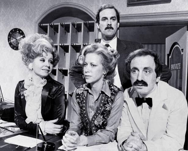 The cast of Fawlty Towers actors Prunella Scales, Connie Booth, John Cleese and Andrew Sachs on the BBC set whilst filming the comedy show in London, UK, on Thursday, January 18, 1979. (Photo by Bryn Colton/Getty Images)