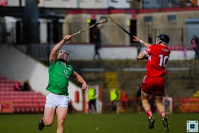 London's Sean O'Meara and Derry's Corey O'Reilly battle for the sliothar. Photo: George Sweeney