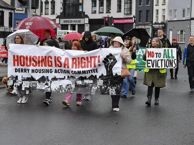 Derry Housing Action Committee protest march over housing crisis makes its way over Craigavon Bridge, heading towards the Guildhall, on Saturday afternoon. Photo: George Sweeney
