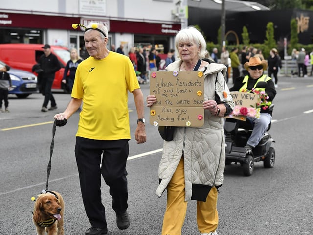 Muff Feile opening parade makes its way through the village on Friday evening. Photo: George Sweeney
