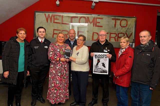 Mayor Sandra Duffy pictured with Bloody Sunday relatives (from left) Brigid Nash, Evan Curran, John McKinney, Kay Duddy, John Kelly, Roslyn Doyle and Michael Doyle at the Bloody Sunday 51 programme of events launch at the Museum of Free Derry on Monday afternoon. Photo: George Sweeney. DER2302GS – 04