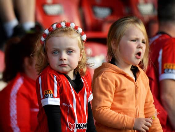 Young fans at Derry City’s game against Sligo Rovers on Friday evening. Photo: George Sweeney. DER2327GS – 068