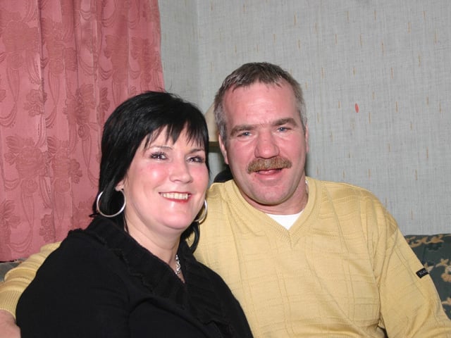 BirthdayGirl Noreen and Husband Pat enjoying the party in the Rocking Chair. 2273/dd : Parties and celebrations January 2006: Noreen Kennedy.