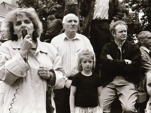 Sinn Féin's Martin McGuinness, Mary Nelis and other party members leading protests calling for all party peace talks.