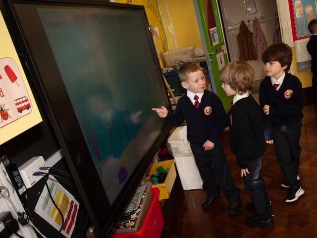 COUNTING JELLYFISH!. . . .P1 pupils Leon, Lennon and Tiernan counting some jellyfish on the screen in Mrs. Michaela McMonagle's class at Holy Child PS.
