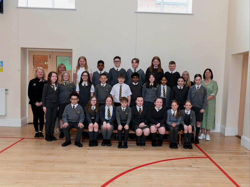 Mrs. Coyle’s P7 class and support staff at Model Primary School.