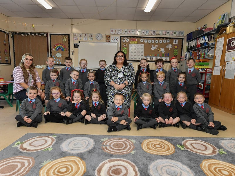 Miss Browse (centre) and Miss Armstrong pictured with P1 pupils at St Brigid’s Primary School.