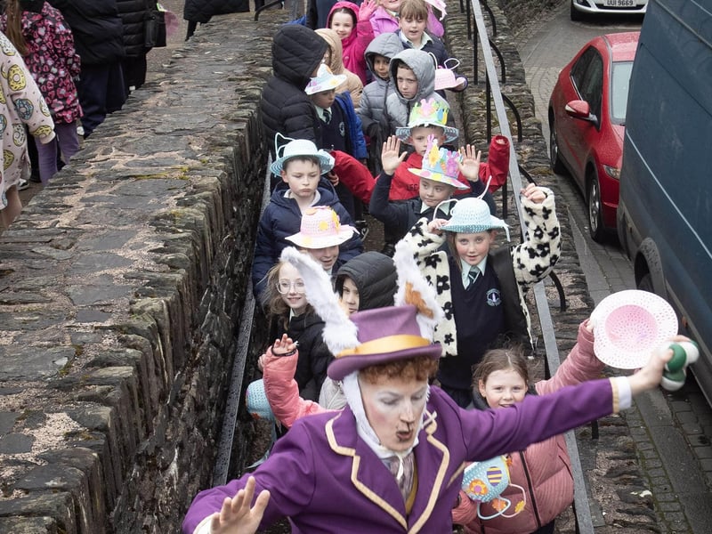 Singing and dancing with the Easter Bunny as pupils leave the city's walls and head to Guildhall Square.