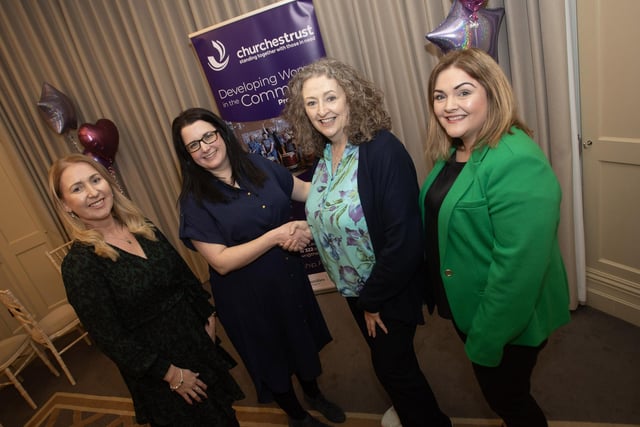 Laura Dunne, Department for Communities being welcomed to Thursday's 'Developing Women in the Community' certificate presentation at the Bishop's Gate Hotel by Mary Holmes, CEO, Churches Trust. Included in photo are Elaine Devenney (left) and Laura Brown (right).