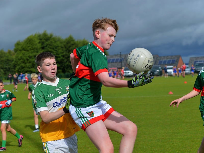 Action from Slaughtmanus against Buncrana during the John McChrystal Cup, held at Doire Trasna, on Saturday morning last. Photo: George Sweeney. DER2332GS - 58
