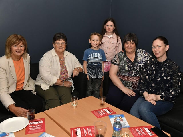 Ladies from Brown and Day's Car Dealership Claudy accompanied by Harry and Rebekah at the opening night of the Grove Theatre Group's production of Annie at the Millennium Forum on Wednesday. Photo: George Sweeney