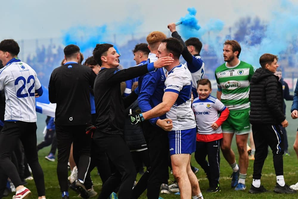 Ballinderry players and fans celebrate the Derry IFC final replay win over Faughanvale at Owenbeg. Photo: George Sweeney