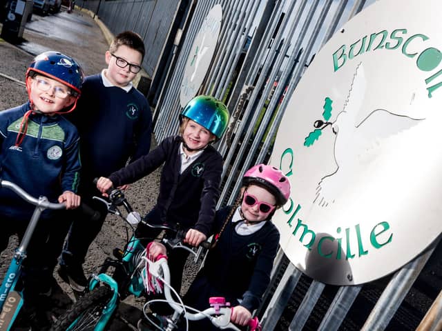 Children from Buscoil Cholmcille, Derry, one of the schools participating in the Active School Travel Programme funded by PHA and DfI, launch the Sustrans Big Walk and Wheel 2025 in Northern Ireland. StephenLatimer/Sustrans