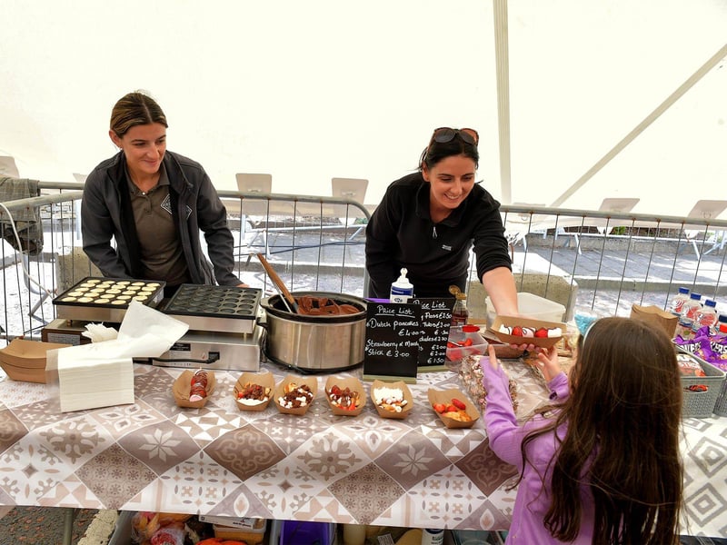 Strawberries with marshmallows were popular at the Cardonagh Family fun Day on Saturday afternoon last. Photo: George Sweeney. DER2327GS - 089