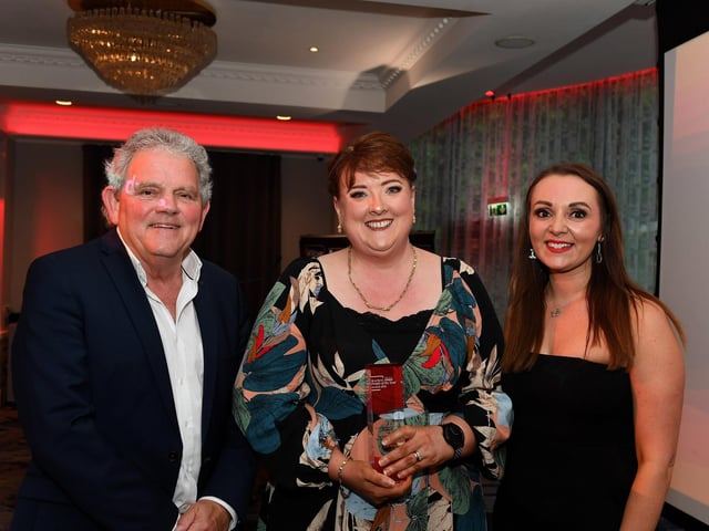 Fundraiser of the Year Award winner Lynn Kelly receives her award from Head of Marketing at Kingsbridge Healthcare Group Claire Winter and compere Adrian Logan. Photo: George Sweeney